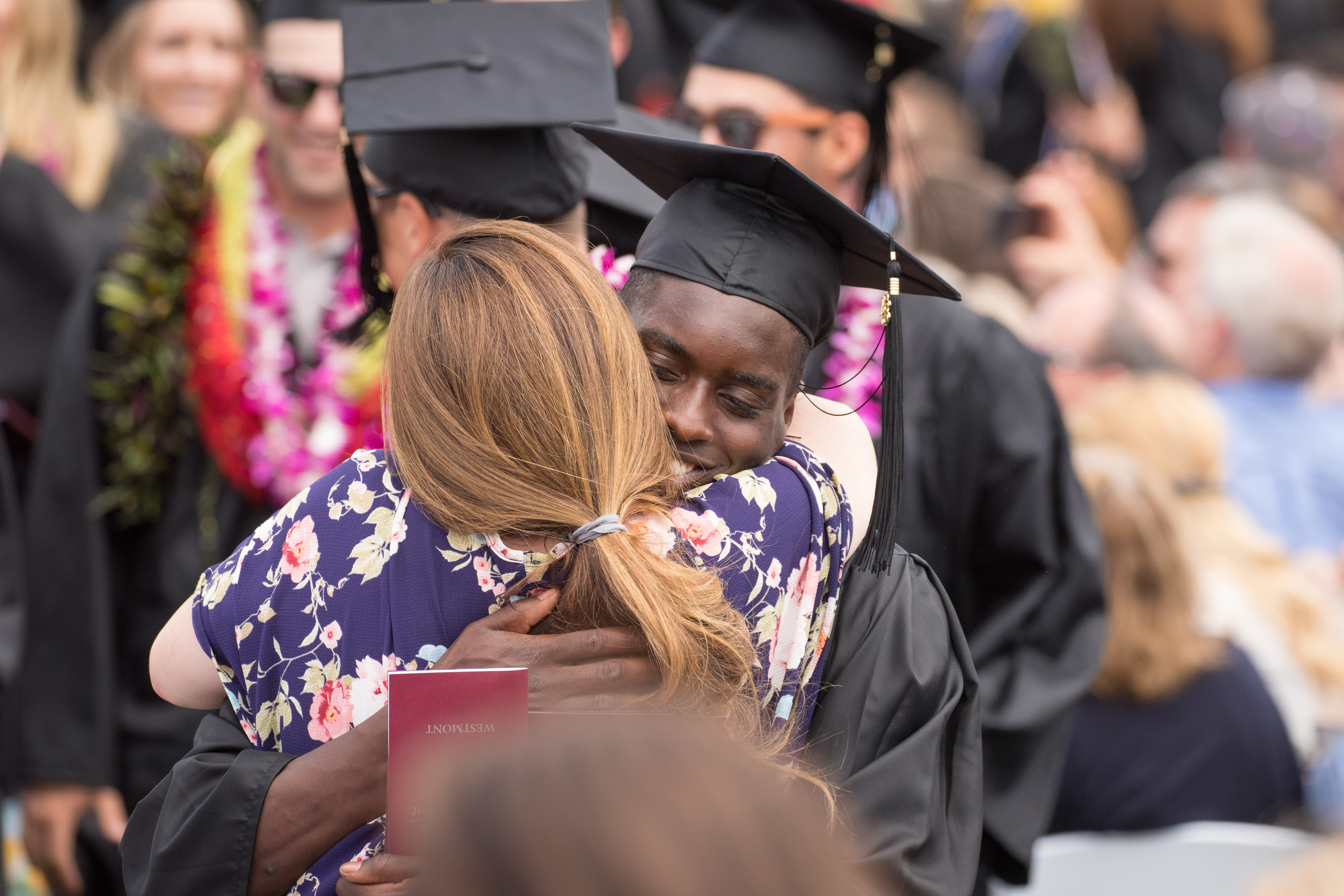 Student hugging at commencement