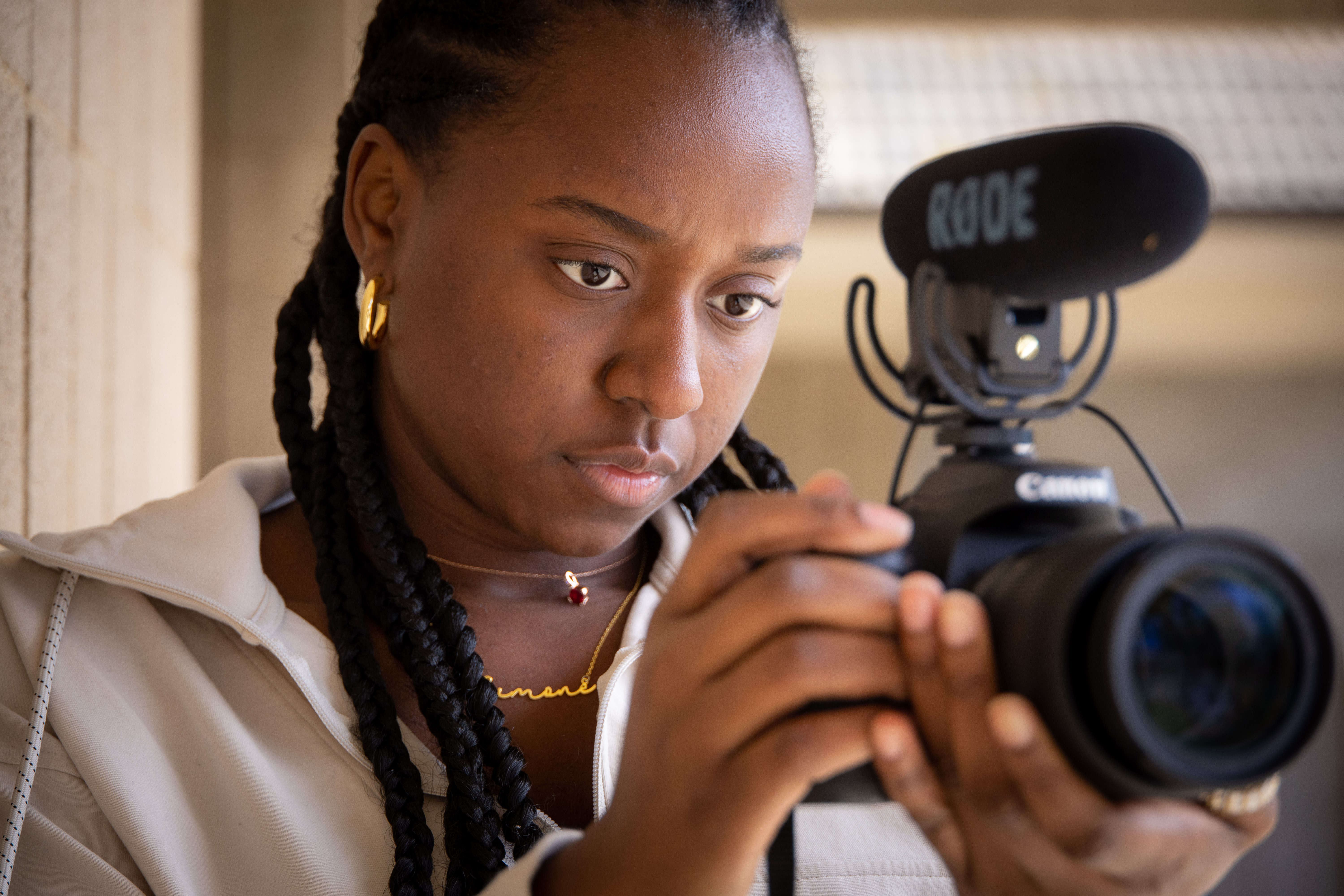 woman holding video camera